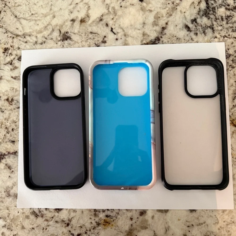 Set of 3 iPhone 15 Pro Max Cases Marble Design, Clear, and Black Transparent
